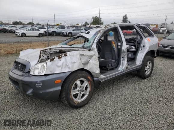 2003 Hyundai Santa Fe GLS с VIN KM8SC73D03U458797, выставлен на аукционе Copart как лот 69877294 с пробегом Не указан миль и Списание • Salvage title. История ставок и продаж доступна на DreamBid. Изображение 1.