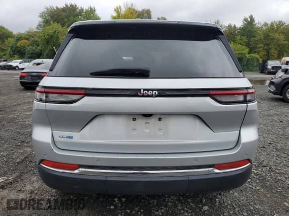 2023 Jeep Grand Cherokee with VIN 1C4RJYB64PC649720, listed as a Copart auction lot 84032325 with 59,572 mi miles and Clean title. Bid and sale history available at DreamBid. Image 6.