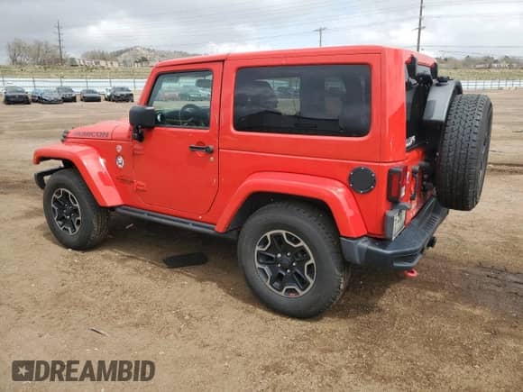 2016 Jeep Wrangler Rubicon with VIN 1C4BJWCG0GL303158, listed as a Copart auction lot 51959055 with 79,654 mi miles and Salvage title. Bid and sale history available at DreamBid. Image 2.