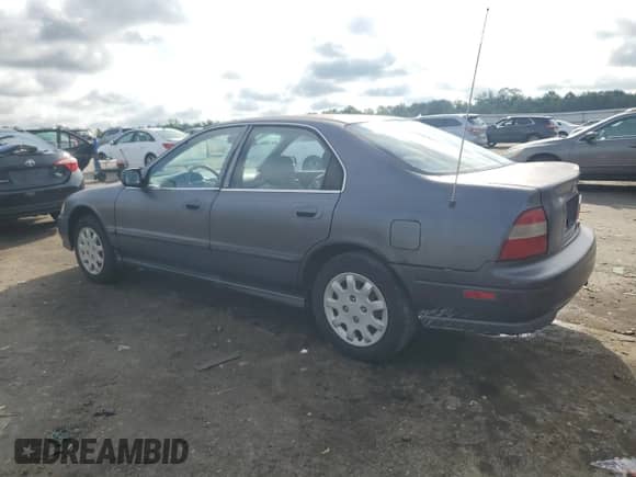 1995 Honda Accord LX z VIN 1HGCD5538SA042335, wystawiony jako Copart lot #65115405 z przebiegiem 272 051 mil mil oraz Szkoda całkowita • Salvage title. Historia ofert i sprzedaży dostępna na DreamBid. Obrazek 2.