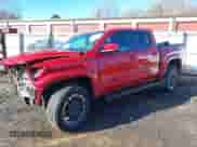 2024 Toyota Tacoma SR5 with VIN 3TYLB5JN1RT001686, listed as a IAAI auction lot 41071582 with 5,986 mi miles and . Bid and sale history available at DreamBid. Image 2.