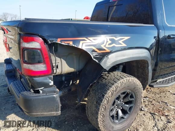 2021 Ram 1500 TRX с VIN 1C6SRFU99MN758770, выставлен на аукционе IAAI как лот 38873371 с пробегом 59 097 миль миль и . История ставок и продаж доступна на DreamBid. Изображение 6.