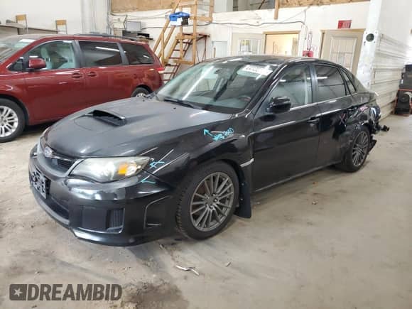 2014 Subaru WRX WRX with VIN JF1GV7E62EG010698, listed as a Copart auction lot 64136105 with 108,849 mi miles and Salvage title. Bid and sale history available at DreamBid. Image 1.