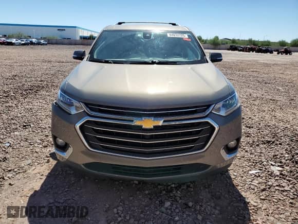 2018 Chevrolet Traverse Premier с VIN 1GNERKKWXJJ137281, выставлен на аукционе Copart как лот 84072725 с пробегом 119 794 миль миль и Списание • Salvage title. История ставок и продаж доступна на DreamBid. Изображение 5.