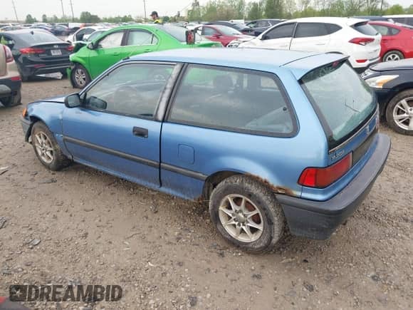 1991 Honda Civic z VIN 2HGED634XMH576080, wystawiony jako IAAI lot #42126557 z przebiegiem 271 729 mil mil oraz . Historia ofert i sprzedaży dostępna na DreamBid. Obrazek 3.