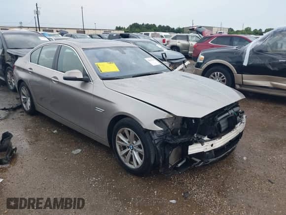 2014 BMW 5 Series 528i z VIN WBA5A5C50ED503595, wystawiony jako IAAI lot #42641762 z przebiegiem 100 608 mil mil oraz . Historia ofert i sprzedaży dostępna na DreamBid. Obrazek 1.