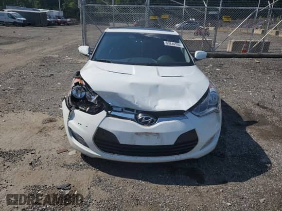 2012 Hyundai Veloster w/Red Int z VIN KMHTC6AD5CU058901, wystawiony jako Copart lot #69244165 z przebiegiem 97 260 mil mil oraz Szkoda całkowita • Salvage title. Historia ofert i sprzedaży dostępna na DreamBid. Obrazek 5.