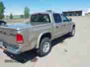 2002 Dodge Dakota SLT with VIN 1B7HG48N32S644931, listed as a IAAI auction lot 42320007 with 88,367 mi miles and . Bid and sale history available at DreamBid. Image 4.