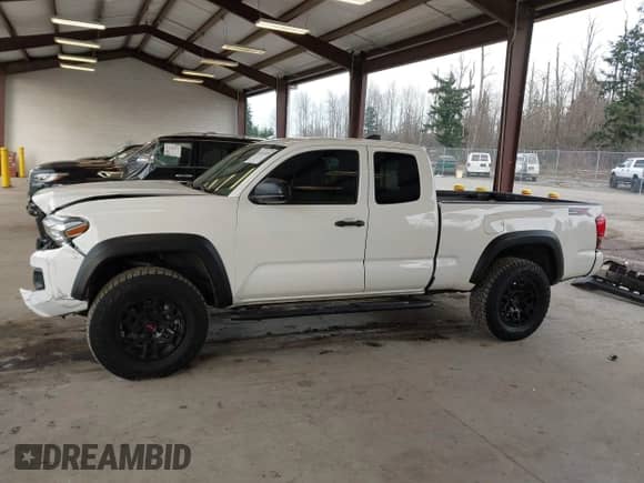 2021 Toyota Tacoma SR with VIN 3TYSZ5AN4MT044869, listed as a IAAI auction lot 41413459 with 62,446 mi miles and . Bid and sale history available at DreamBid. Image 15.