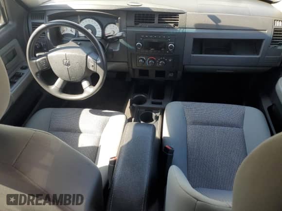 2011 Dodge Dakota с VIN 1D7RE3GP6BS648842, выставлен на аукционе Copart как лот 55478375 с пробегом 102 974 миль миль и Списание • Salvage title. История ставок и продаж доступна на DreamBid. Изображение 8.