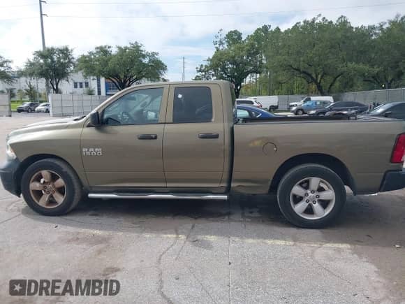 2013 Ram 1500 Tradesman z VIN 1C6RR6FP7DS602965, wystawiony jako IAAI lot #43158992 z przebiegiem 197 214 mil mil oraz . Historia ofert i sprzedaży dostępna na DreamBid. Obrazek 14.