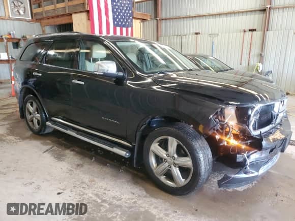 2013 Dodge Durango Citadel с VIN 1C4RDJEG8DC500760, выставлен на аукционе Copart как лот 63512395 с пробегом 107 513 миль миль и Списание • Salvage title. История ставок и продаж доступна на DreamBid. Изображение 4.