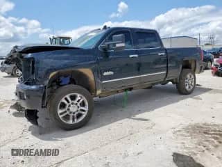 2018 Chevrolet Silverado 2500HD High Country с VIN 1GC1KXEY7JF213404, выставлен на аукционе Copart как лот 56875115 с пробегом 147 364 миль миль и Списание • Salvage title. История ставок и продаж доступна на DreamBid. Изображение 1.