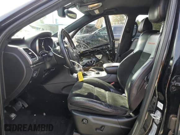 2017 Jeep Grand Cherokee Trailhawk z VIN 1C4RJFLG9HC900194, wystawiony jako Copart lot #81602365 z przebiegiem 105 693 mil mil oraz Szkoda całkowita • Salvage title. Historia ofert i sprzedaży dostępna na DreamBid. Obrazek 7.