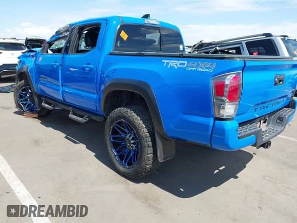 2021 Toyota Tacoma SR with VIN 3TMCZ5AN0MM377425, listed as a IAAI auction lot 43232397 with Not provided miles and . Bid and sale history available at DreamBid. Image 3.