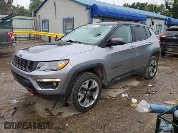 2019 Jeep Compass Trailhawk with VIN 3C4NJDDB7KT671080, listed as a Copart auction lot 60645655 with 131,581 mi miles and Salvage title. Bid and sale history available at DreamBid. Image 1.