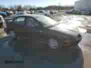 2000 Saturn SL with VIN 1G8ZH5283YZ169267, listed as a Copart auction lot 42626335 with 131,556 mi miles and Salvage title. Bid and sale history available at DreamBid. Image 4.