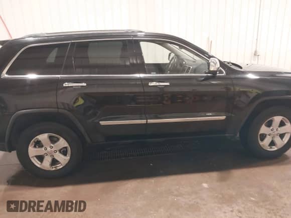 2011 Jeep Grand Cherokee 70th Anniversary с VIN 1J4RR4GG3BC680723, выставлен на аукционе IAAI как лот 41748828 с пробегом 166 480 миль миль и . История ставок и продаж доступна на DreamBid. Изображение 14.