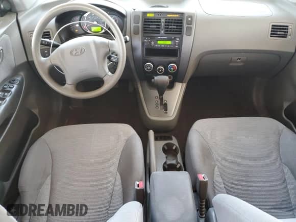 2006 Hyundai Tucson GL z VIN KM8JM12B76U462890, wystawiony jako Copart lot #85090795 z przebiegiem 139 274 mil mil oraz Szkoda całkowita • Salvage title. Historia ofert i sprzedaży dostępna na DreamBid. Obrazek 8.