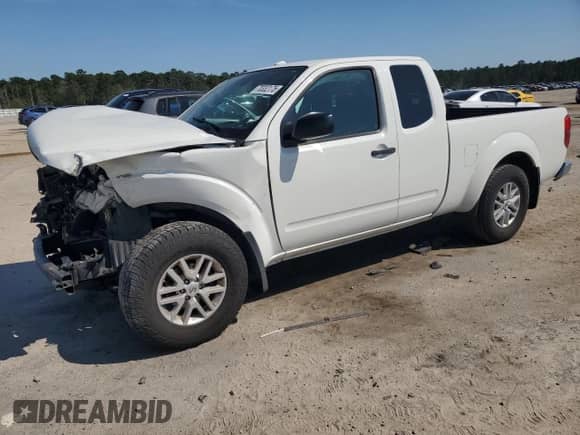 2018 Nissan Frontier SV with VIN 1N6BD0CT1JN704809, listed as a Copart auction lot 70332175 with 71,667 mi miles and Salvage title. Bid and sale history available at DreamBid. Image 1.