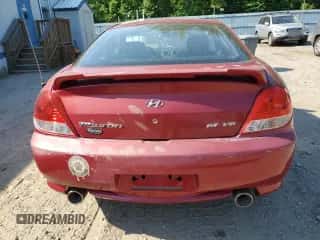 2006 Hyundai Tiburon GT с VIN KMHHN65F06U204556, выставлен на аукционе Copart как лот 82749974 с пробегом 95 270 миль миль и На запчасти • Non repairable. История ставок и продаж доступна на DreamBid. Изображение 6.