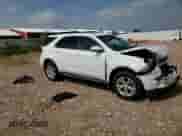 2015 Chevrolet Equinox LT z VIN 2GNFLFE32F6214678, wystawiony jako Copart lot #71291665 z przebiegiem 129 838 mil mil oraz Szkoda całkowita • Salvage title. Historia ofert i sprzedaży dostępna na DreamBid. Obrazek 14.