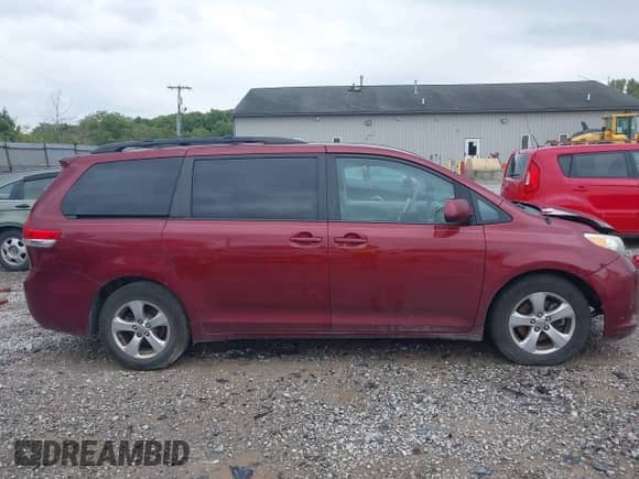 2013 Toyota Sienna LE AAS with VIN 5TDKK3DCXDS402491, listed as a IAAI auction lot 43140317 with 249,496 mi miles and . Bid and sale history available at DreamBid. Image 13.