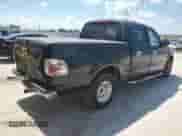 2002 Ford F-150 XLT с VIN 1FTRW07L22KB04146, выставлен на аукционе Copart как лот 69320515 с пробегом 189 839 миль миль и Списание • Salvage title. История ставок и продаж доступна на DreamBid. Изображение 3.