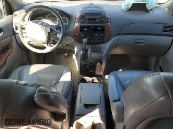 2004 Toyota Sienna XLE z VIN 5TDZA22C84S156121, wystawiony jako Copart lot #81265855 z przebiegiem Nie podano mil oraz Szkoda całkowita • Salvage title. Historia ofert i sprzedaży dostępna na DreamBid. Obrazek 8.