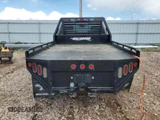 2014 Chevrolet Silverado 3500 с VIN 1GC3K0C8XEF122894, выставлен на аукционе Copart как лот 56937955 с пробегом 117 727 миль миль и Списание • Salvage title. История ставок и продаж доступна на DreamBid. Изображение 6.