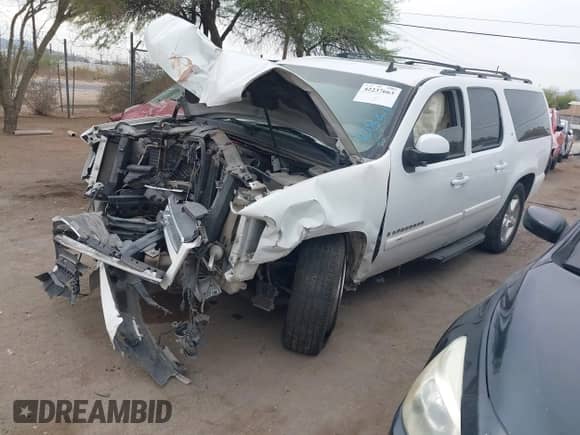2009 Chevrolet Suburban 1LT z VIN 1GNFC260X9J108211, wystawiony jako IAAI lot #42237663 z przebiegiem Nie podano mil oraz . Historia ofert i sprzedaży dostępna na DreamBid. Obrazek 16.