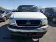 2003 Ford F-150 XL with VIN 1FTRX07W83KD05672, listed as a Copart auction lot 85000995 with 182,016 mi miles and Salvage title. Bid and sale history available at DreamBid. Image 5.