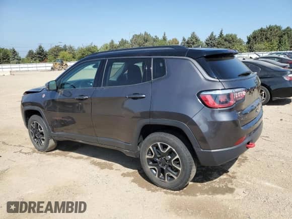 2020 Jeep Compass Trailhawk with VIN 3C4NJDDBXLT163395, listed as a Copart auction lot 81366435 with 56,199 mi miles and Salvage title. Bid and sale history available at DreamBid. Image 2.
