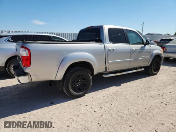 2006 Toyota Tundra SR5 с VIN 5TBDT44136S520159, выставлен на аукционе Copart как лот 82288515 с пробегом 146 243 миль миль и Списание • Salvage title. История ставок и продаж доступна на DreamBid. Изображение 3.