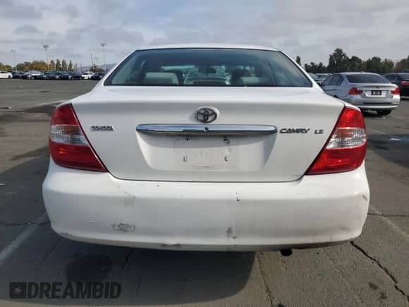 2004 Toyota Camry LE z VIN JTDBE32K540272608, wystawiony jako Copart lot #90066615 z przebiegiem 337 761 mil mil oraz Czysty tytuł • Clean title. Historia ofert i sprzedaży dostępna na DreamBid. Obrazek 6.