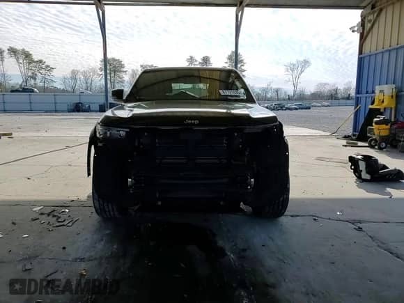 2023 Jeep Grand Cherokee Overland z VIN 1C4RJGDG5PC540909, wystawiony jako Copart lot #87721035 z przebiegiem 24 289 mil mil oraz Szkoda całkowita • Salvage title. Historia ofert i sprzedaży dostępna na DreamBid. Obrazek 12.