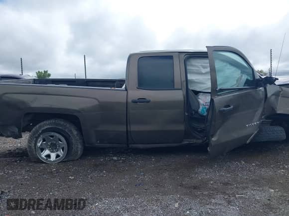 2014 Chevrolet Silverado 1500 Work Truck z VIN 1GCRCPEH7EZ380639, wystawiony jako IAAI lot #43088985 z przebiegiem Nie podano mil oraz . Historia ofert i sprzedaży dostępna na DreamBid. Obrazek 13.