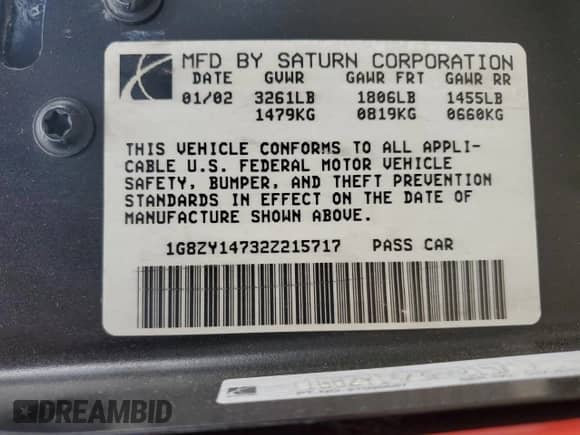 2002 Saturn SC with VIN 1G8ZY14732Z215717, listed as a Copart auction lot 57707765 with 85,232 mi miles and Salvage title. Bid and sale history available at DreamBid. Image 13.