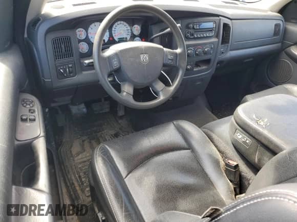 2004 Dodge 1500 SLT z VIN 1D7HU16D94J252147, wystawiony jako Copart lot #69676965 z przebiegiem 203 830 mil mil oraz Szkoda całkowita • Salvage title. Historia ofert i sprzedaży dostępna na DreamBid. Obrazek 8.