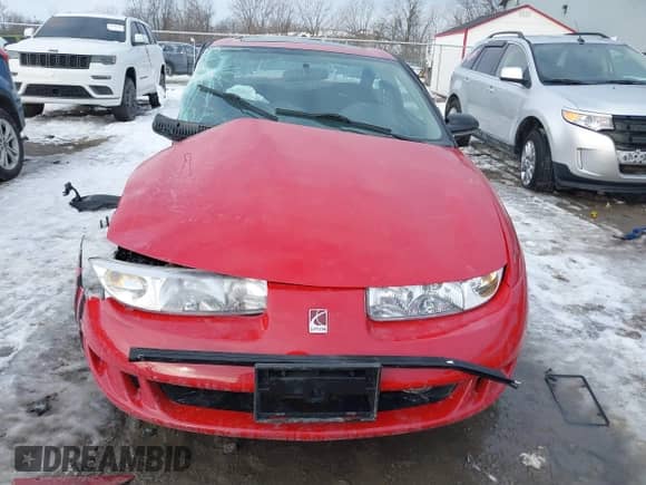 1998 Saturn SC z VIN 1G8ZG1273WZ285665, wystawiony jako IAAI lot #41633922 z przebiegiem Nie podano mil oraz . Historia ofert i sprzedaży dostępna na DreamBid. Obrazek 11.