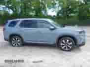 2025 Honda Pilot Touring with VIN 5FNYG2H70SB011614, listed as a IAAI auction lot 42205848 with 37,719 mi miles and . Bid and sale history available at DreamBid. Image 13.