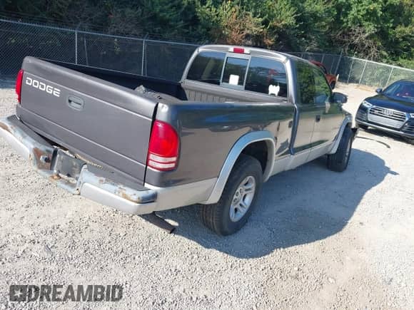 2002 Dodge Dakota SLT with VIN 1B7GL42X92S512287, listed as a IAAI auction lot 43082241 with 151,099 mi miles and . Bid and sale history available at DreamBid. Image 4.