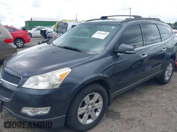 2011 Chevrolet Traverse 2LT с VIN 1GNKRJED2BJ169456, выставлен на аукционе IAAI как лот 39992005 с пробегом 176 335 миль миль и . История ставок и продаж доступна на DreamBid. Изображение 2.