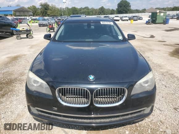 2012 BMW 7 Series 750i with VIN WBAKA8C59CDY99916, listed as a Copart auction lot 82019145 with 104,713 mi miles and Clean title. Bid and sale history available at DreamBid. Image 5.