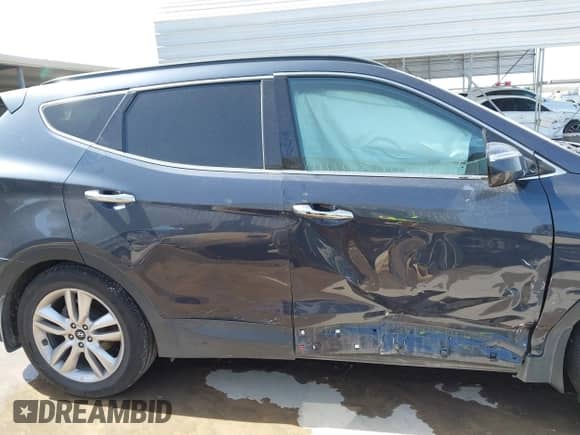 2016 Hyundai Santa Fe z VIN 5XYZW4LA8GG338087, wystawiony jako IAAI lot #41730229 z przebiegiem 156 062 mil mil oraz . Historia ofert i sprzedaży dostępna na DreamBid. Obrazek 13.