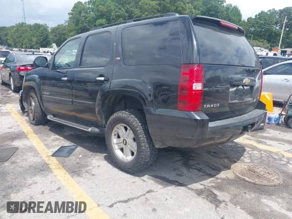 2007 Chevrolet Tahoe LT with VIN 1GNFC13037R423235, listed as a IAAI auction lot 42992915 with 148,780 mi miles and . Bid and sale history available at DreamBid. Image 3.