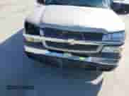 2004 Chevrolet Silverado 1500 Work Truck z VIN 1GCEC14X64Z332584, wystawiony jako IAAI lot #41802624 z przebiegiem 165 172 mil mil oraz . Historia ofert i sprzedaży dostępna na DreamBid. Obrazek 6.