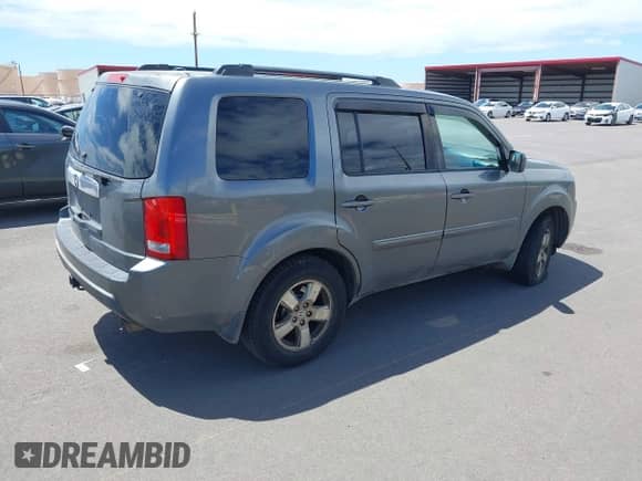 2011 Honda Pilot EX with VIN 5FNYF3H40BB022255, listed as a IAAI auction lot 43214634 with 202,374 mi miles and . Bid and sale history available at DreamBid. Image 4.