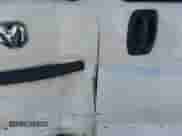 2023 Ram ProMaster Cargo z VIN 3C6LRVDG1PE535614, wystawiony jako IAAI lot #43086398 z przebiegiem 58 721 mil mil oraz . Historia ofert i sprzedaży dostępna na DreamBid. Obrazek 6.