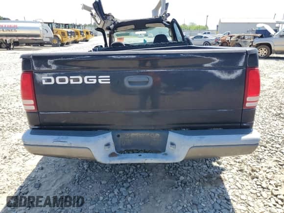 2002 Dodge Dakota с VIN 1B7GL12X92S578496, выставлен на аукционе Copart как лот 53506265 с пробегом Не указан миль и Списание • Salvage title. История ставок и продаж доступна на DreamBid. Изображение 6.